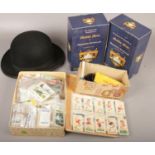 A group of collectables to include Bowler hat, large quantity of cigarette cards, pen knifes etc.