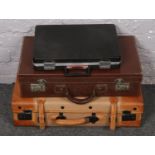 Three cases to include leather suitcase, briefcase etc.