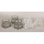 Six Dartington glass hexagonal candle holders by Frank Thrower. FT88 with moulded panel and spot