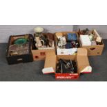 Four boxes of miscellaneous to include Bauer ice hockey skates, west Germany vases, football