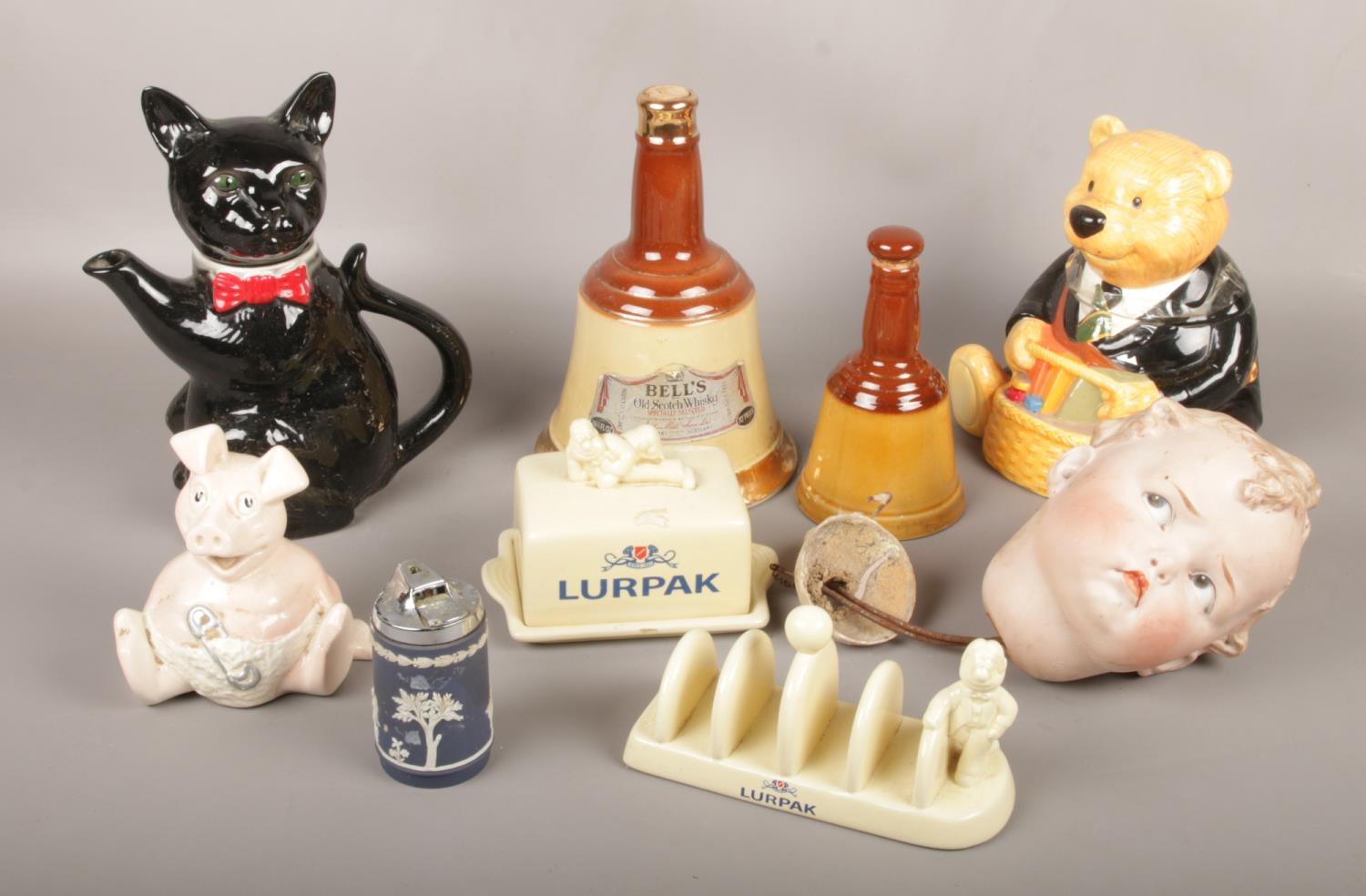 A group of assorted ceramic's, Lurpuk butter dish and toast rack, Bell's Scotch Whiskey Wade