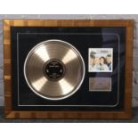A framed ABBA, Legends of Rock & Roll, gold tribute disc. Provenance, Lathom Hall, Liverpool.