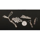Five pieces of Scottish silver jewellery including Ola Marie Gorie entwined beasts brooch, other