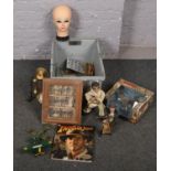A box of collectables to include diecast planes, figures in display case, old telephone, mannequin