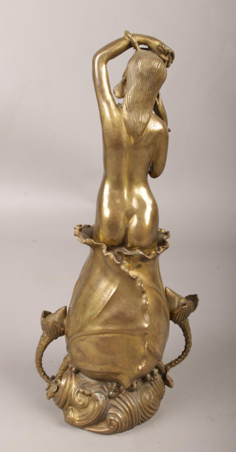 An Art Nouveau style bronze figure of a nude maiden. (Height 27cm). - Image 2 of 3