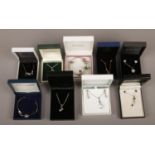 Nine pieces of boxed silver jewellery including earring and pendant sets.