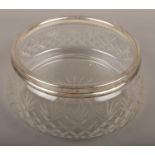 A cut glass silver rimmed bowl, assayed London 1923.