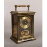 An Acctim brass cased 8 day carriage clock. With bob pendulum and striking on a bell, 18cm. Running.
