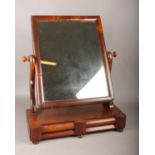 A Victorian mahogany toilet mirror, with two drawer base.