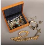 A box of costume jewellery to include Trifari, bangles, brooches, necklaces etc.