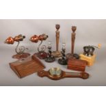 A box of wooden wares, to include candlesticks, barometer, coffee grinder etc.