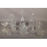 A collection of cut crystal glass wares, Waterford & Edinburgh decanters, vases, candlesticks etc