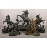 Five spelter figure groups, to include examples after Coustou and E. Soukanech.