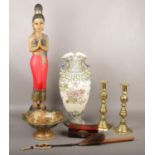 A group of oriental style wares, ceramic vase, wooden figurine, brass candlesticks etc