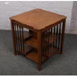 An oak revolving bookcase.