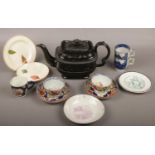 A Jackfield teapot, first period Worcester coffee cup, Wedgwood creamware, pearlware and other early