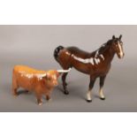 Two Beswick porcelain figures, one of a chestnut horse, the other a highland cow. Restoration to