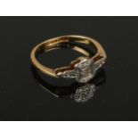 A small mid 20th century 18ct gold and platinum diamond ring. Size H, 1.52g gross weight.