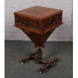 A Victorian carved and inlaid mahogany sewing box.