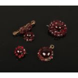 Four pieces of vintage jewellery set with garnet carbuncles. All piece no damage in good condition.