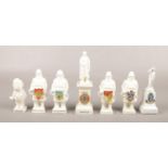 A collection of crested china figures, to include Arcadian Newton statue, fishermen, The Colonel