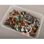 A box of costume jewellery to include beads, bangles, necklaces, etc.