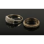 A 9ct gold and diamond ring (2.37g), along with a 9ct gold and paste eternity ring (2.58g).