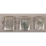 Three silver vesta cases to include assayed Birmingham 1906 by H Samuel Ltd example, 67g.