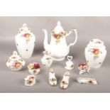 A collection of Royal Albert Bone China ' Old Country Roses', tea pot, ginger jars, trinket, shoes