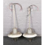 Two industrial ceiling lights.