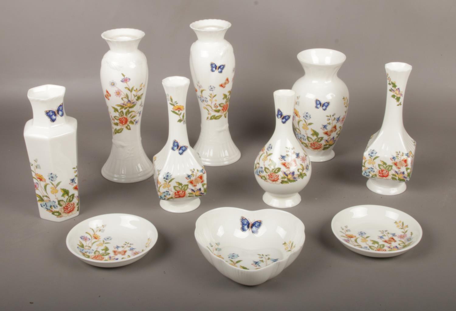 A collection of Aynsley Bone China 'Cottage Garden', vases, pin dishes , candlesticks etc