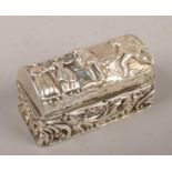 An Edwardian silver casket with figural repousse decoration, assayed Birmingham 1907 by George