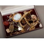 A box of jewellery and collectables including glass intaglio, middle eastern carnelian seal, gilt