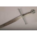 A decorative Toledo sword, marked Tanto Monta (Length 121cm).
