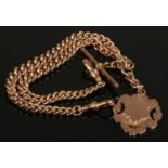 A 9ct gold fob on chain with T bar, 54.42g, 36cm long. No damage, good condition.