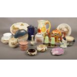 A collection of ceramic wares, jugs, teapots, plates, salt and pepper pots etc