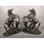 After Coustou, A large pair of spelter Marly Horses. (Height 50cm).