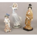 Two Lladro figurines, Girl with bear No 1287, Lady with hat to include oriental figurine. Head on