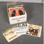 A box of vinyl records, Seal, Casablanca, London Beat examples