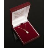 A 9ct gold, freshwater pearl and diamond pendant on chain.