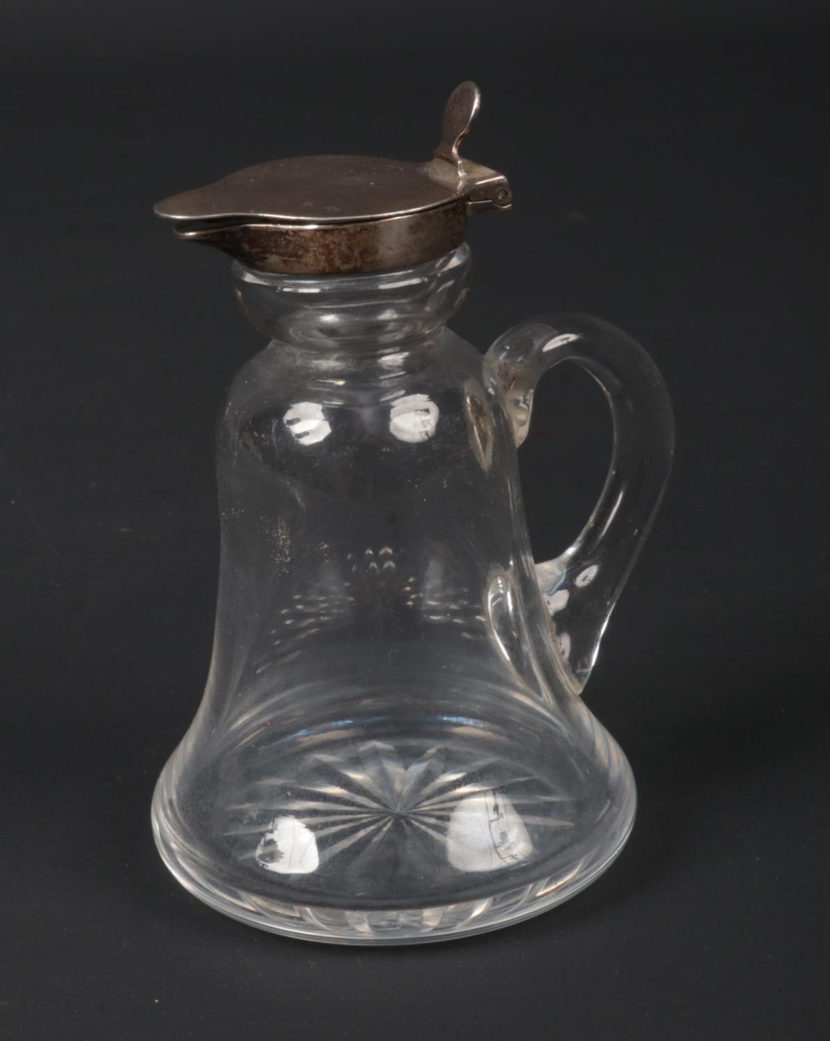 A George V silver mounted glass whisky noggin by Asprey & Co. Ltd. Assayed Birmingham 1917, 9cm.