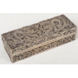 A Chinese silver plated rectangular box and cover. Cast in relief with dragons chasing a flaming