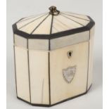 A George III ivory tent top tea caddy. With ebony banding and stringing and having bronze axe head