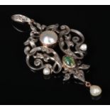 A 19th century gold and silver openwork pendant, bale and drop. Set with rough cut diamonds, a