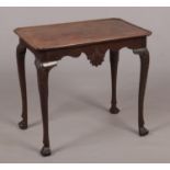 A Irish George II mahogany notched dish top silver table. With shell motifs to the front and rear