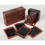 A leather cased Rochester Camera Company mahogany plate camera, Cycle Poco No. 3.