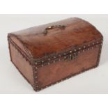 An 18th century Continental leather mounted dome top table casket. With brass studwork, bronze