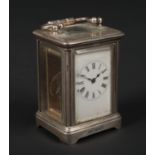 A Victorian silver cased miniature carriage clock by John Millward Banks. With enamel dial and and
