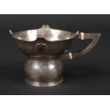 A George V silver cup by Mappin & Webb. Decorated in enamel with the National emblem of Oman. With