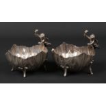 A pair of Spanish silver bowls. Of naturalistic leaf form, with rustic branch moulded feet and